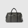 Duffle Bag mit Allover-Label-Muster Modell